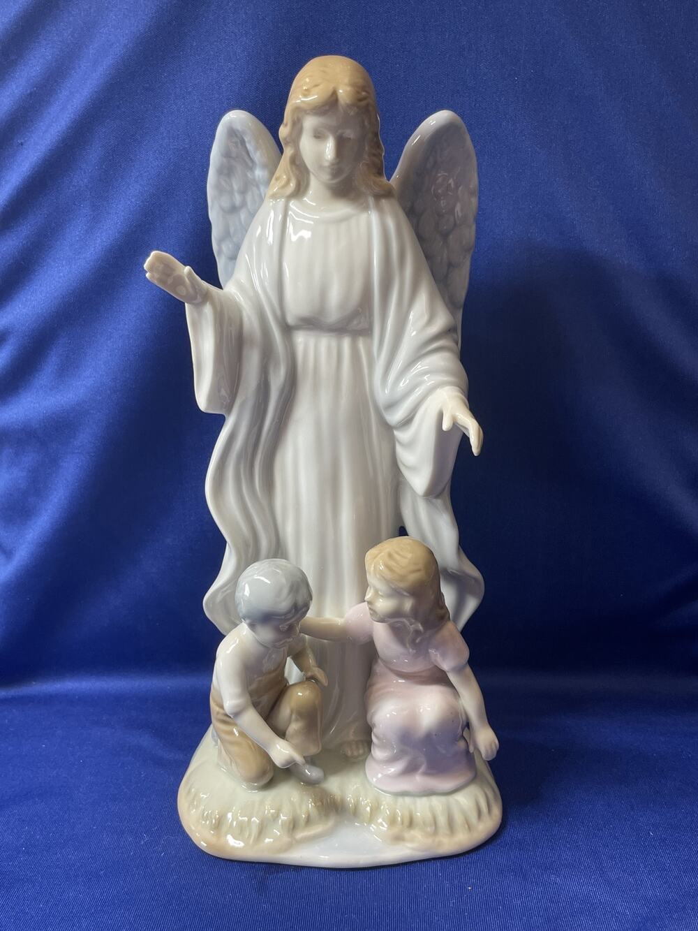 Porcelain Guardian Angel with Children by Roman Japan